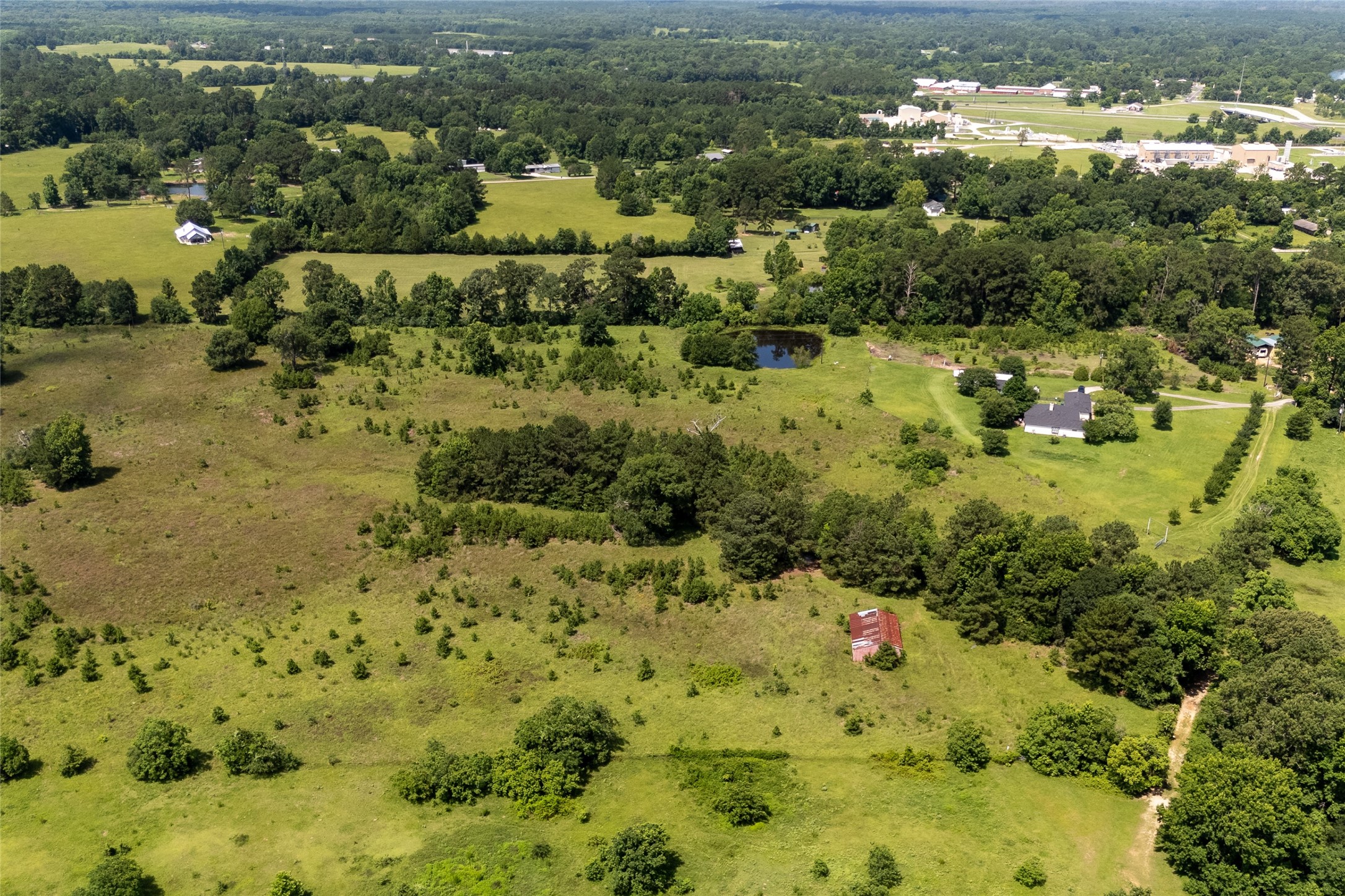 0 R L R L Moffett Street Goodrich, TX 77335 - Photo 7 of 17 a view of a lake with trees