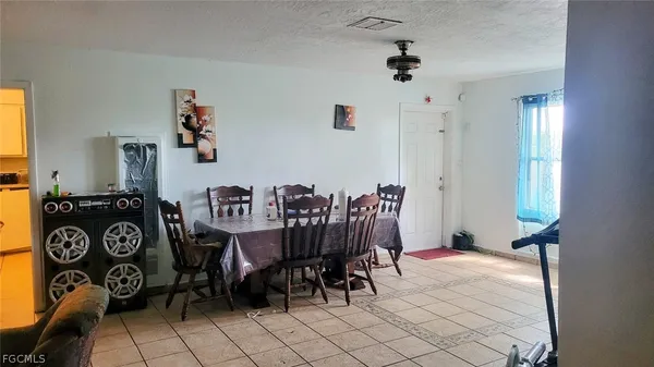 a view of a livingroom with furniture and window
