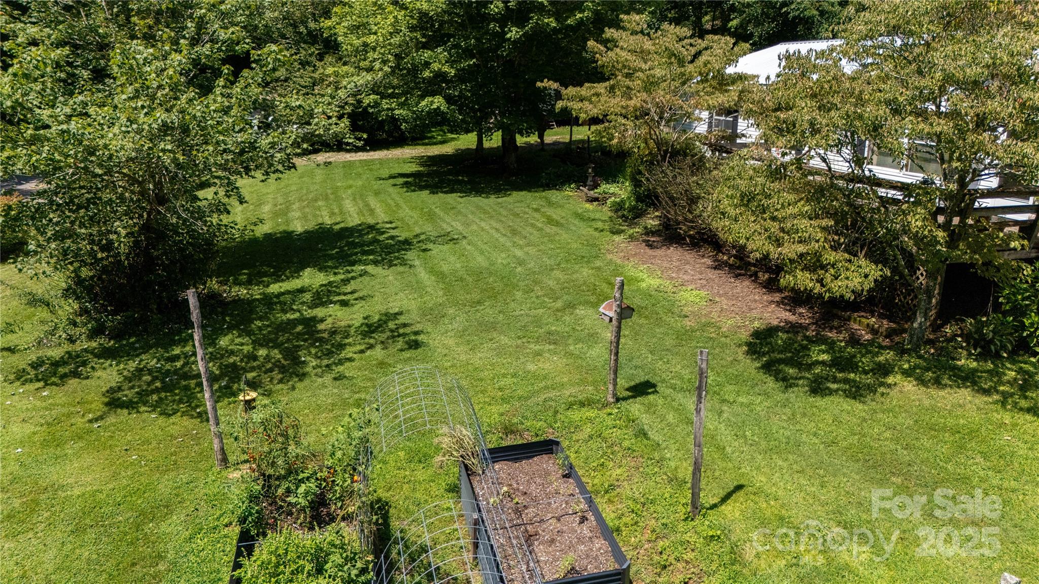614 Upper Doe Bag Road Green Mountain, NC 28740 - Photo 11 of 44 a view of a garden