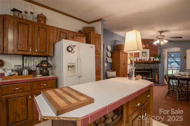 a utility room with a large window and a sink