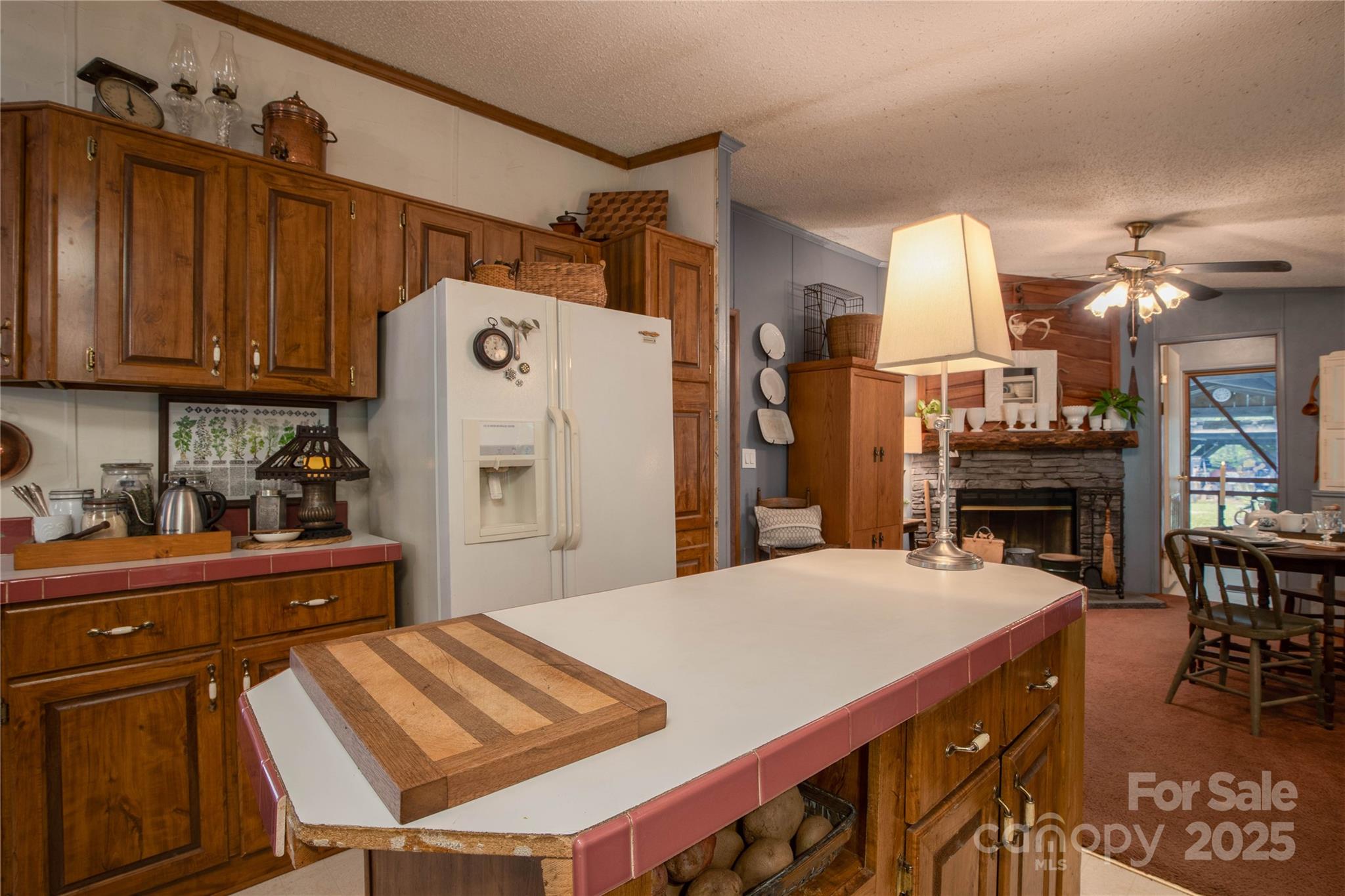 614 Upper Doe Bag Road Green Mountain, NC 28740 - Photo 29 of 44 a kitchen with cabinets and chairs