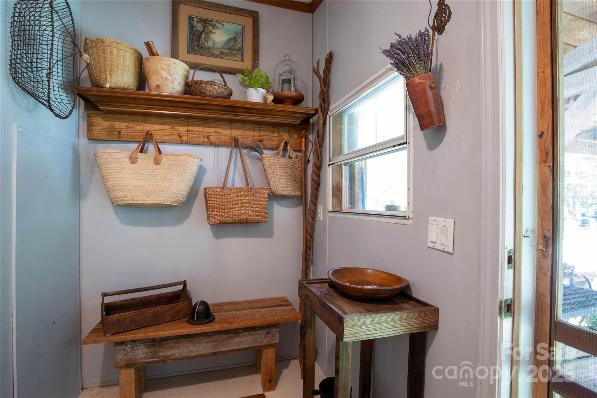 614 Upper Doe Bag Road Green Mountain, NC 28740 - Photo 35 of 44 a view of entryway with furniture and wooden floor