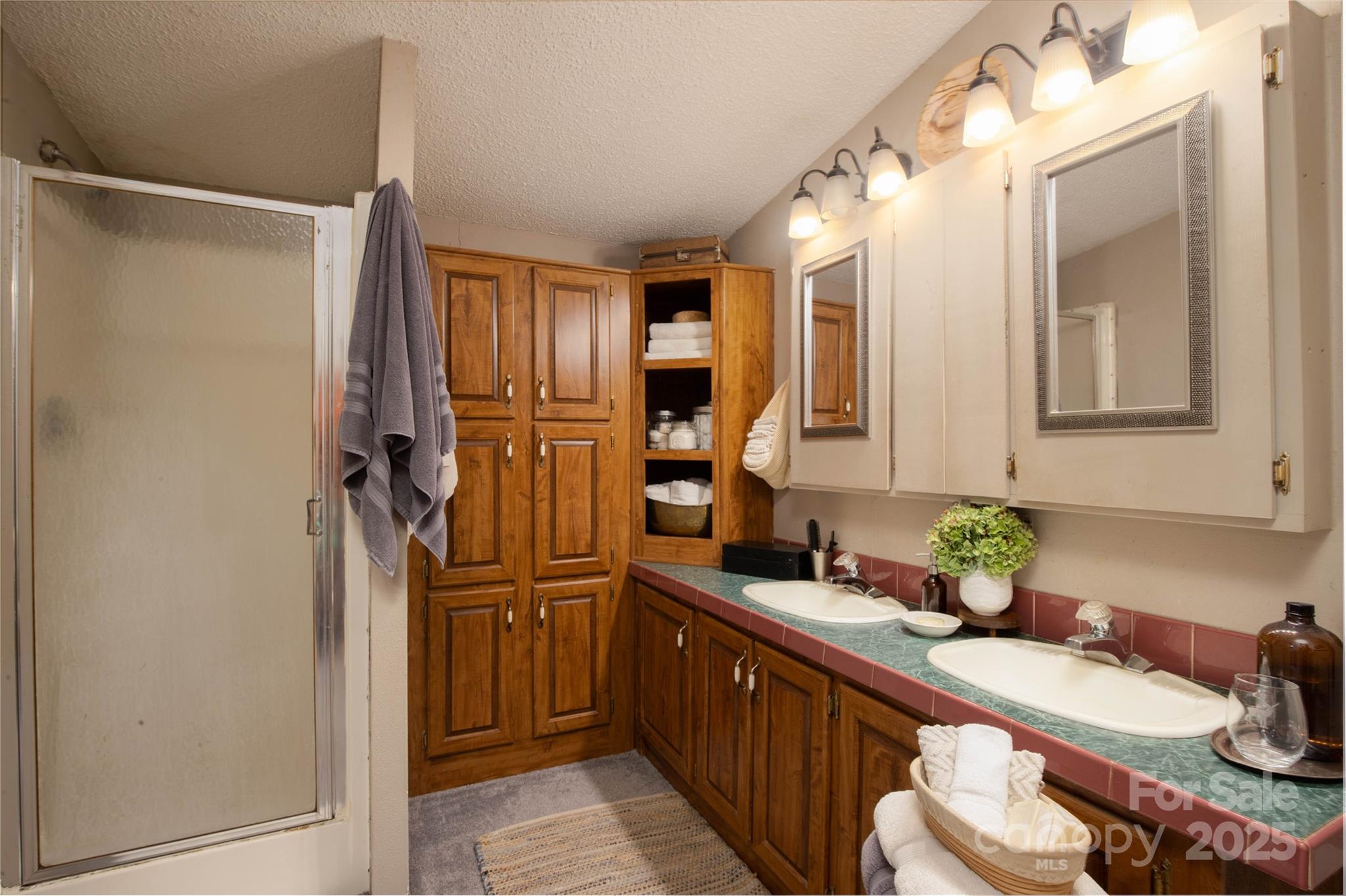 614 Upper Doe Bag Road Green Mountain, NC 28740 - Photo 39 of 44 a kitchen with stainless steel appliances granite countertop a refrigerator and a sink