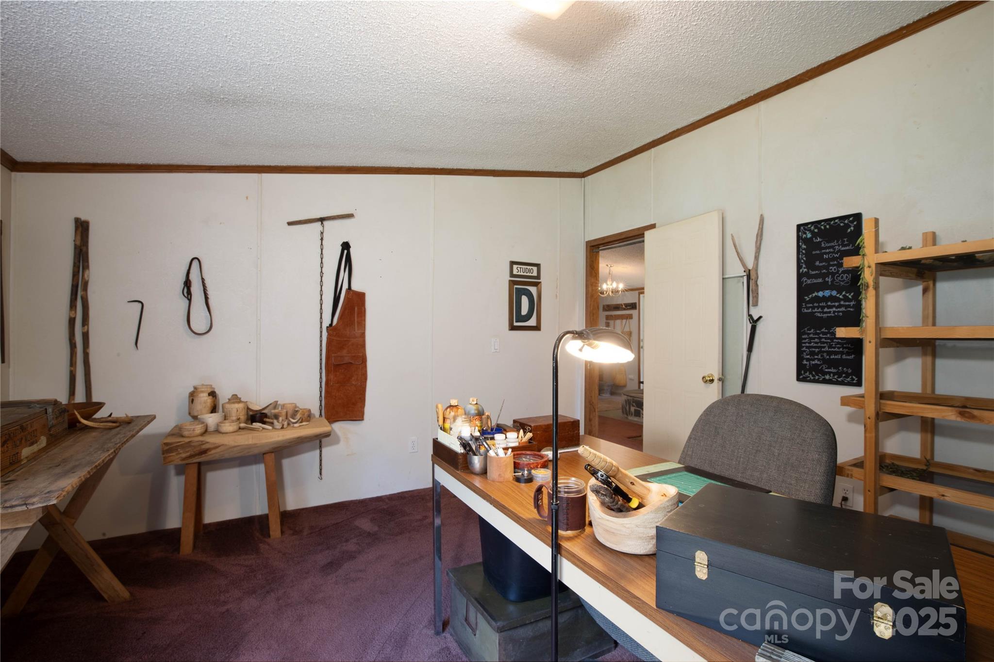 614 Upper Doe Bag Road Green Mountain, NC 28740 - Photo 44 of 44 a work room with furniture and wooden floor