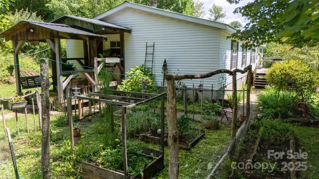 a backyard of a house with seating space
