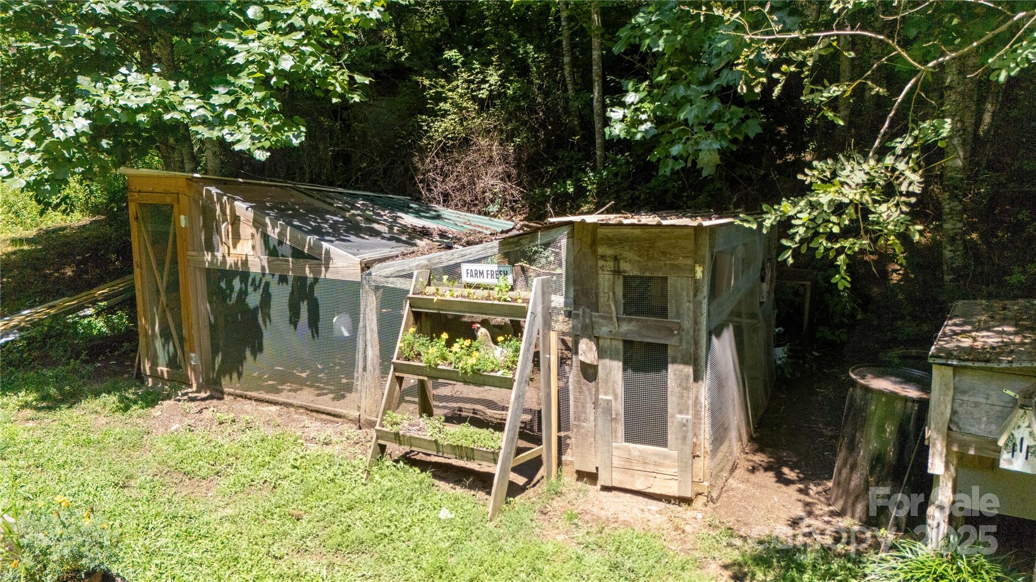 614 Upper Doe Bag Road Green Mountain, NC 28740 - Photo 7 of 44 a view of an chair and table in the patio