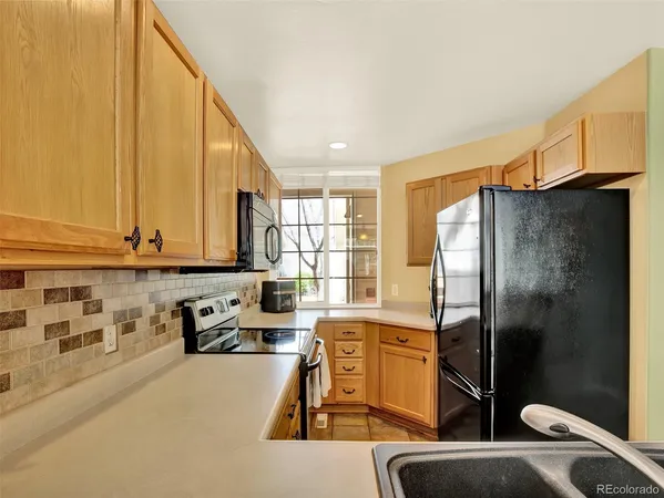 $450,000 | 9186 West Phillips Drive, Littleton, CO 80128