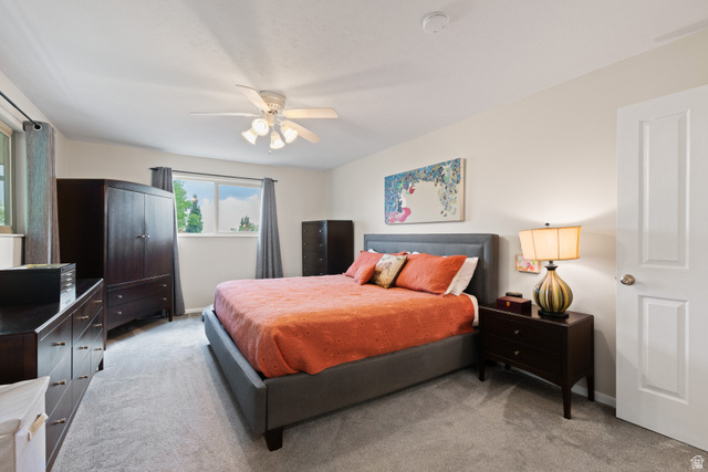 3320 Cherokee Lane Provo, UT 84604 - Photo 21 of 52 Carpeted interior space featuring white walls and a white ceiling with a ceiling fan
