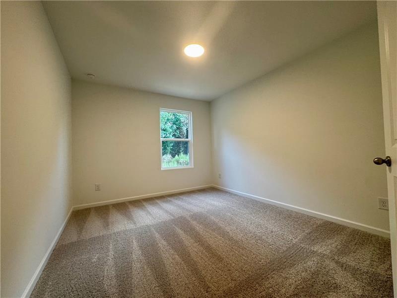 5305 Frontier Court Flowery Branch, GA 30542 - Photo 13 of 30 an empty room with windows