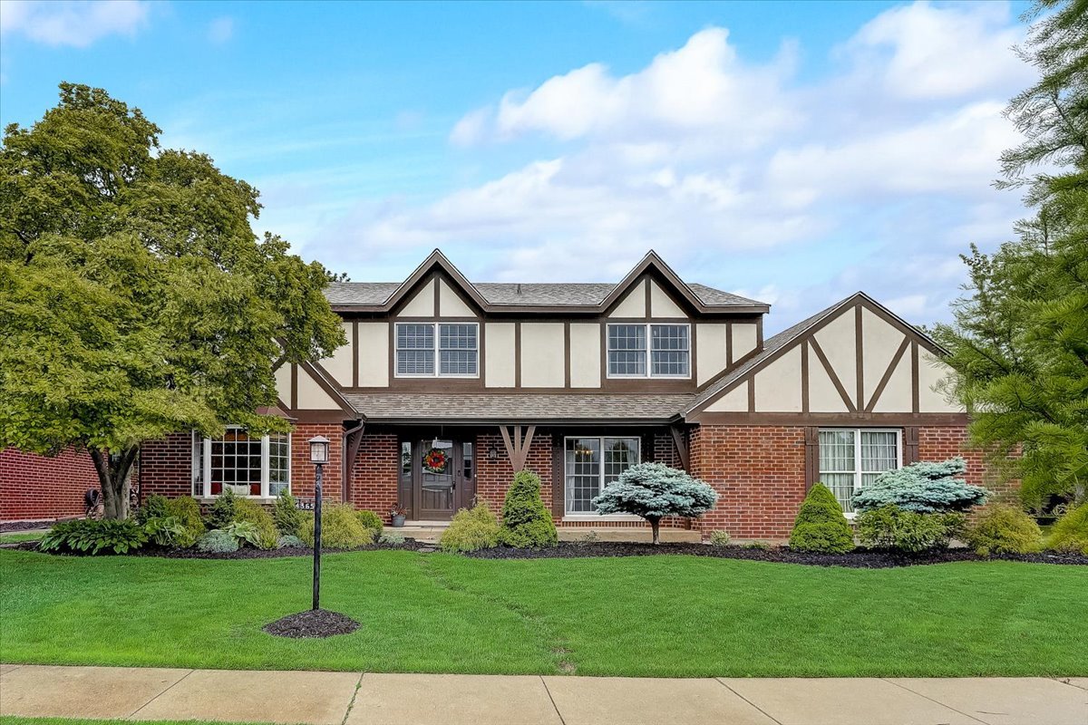4365 Phyllis Drive Northbrook, IL 60062 - Photo 3 of 55 a view of a brick house with a yard