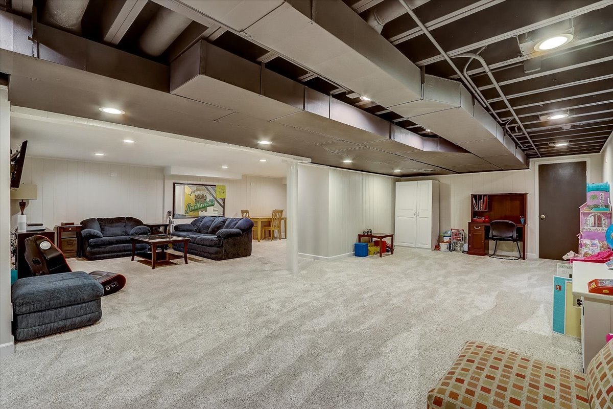 4365 Phyllis Drive Northbrook, IL 60062 - Photo 46 of 55 a view of a room with gym equipment and a large window