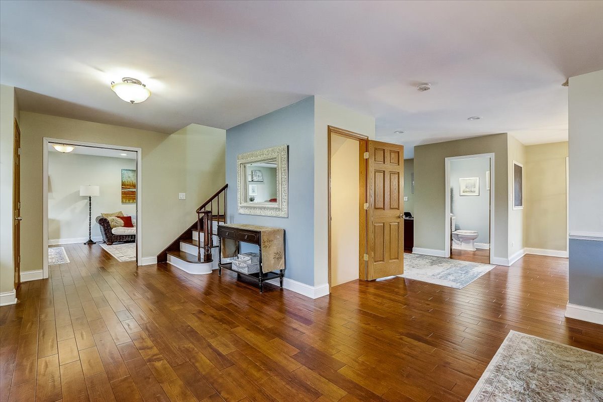 4365 Phyllis Drive Northbrook, IL 60062 - Photo 7 of 55 a view of a livingroom with furniture and wooden floor