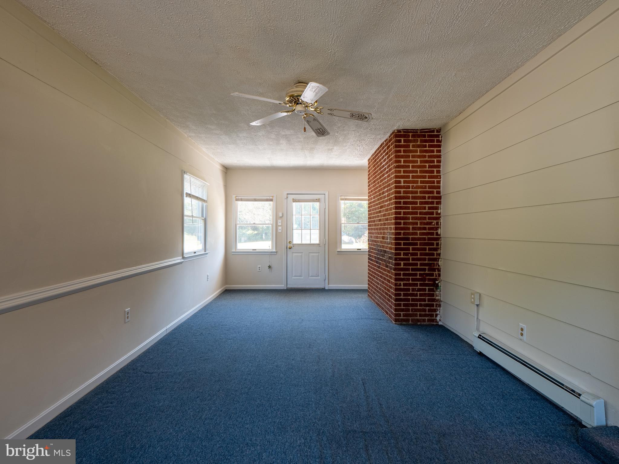 580 Plum Point Road Huntingtown, MD 20639 - Photo 22 of 48 Sun Room off the Dining Room