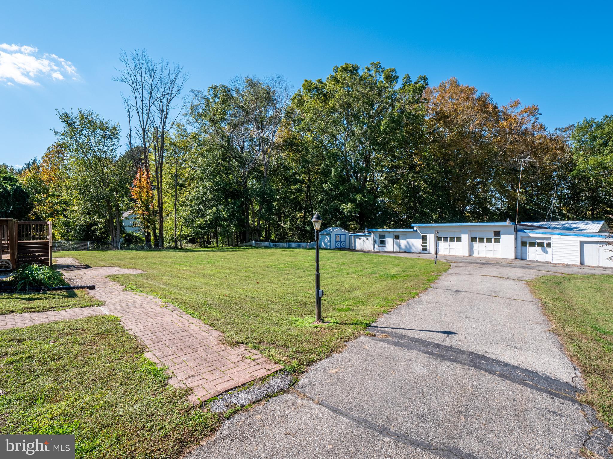 580 Plum Point Road Huntingtown, MD 20639 - Photo 41 of 48 Fenced in Back Yard with driveway to Garages