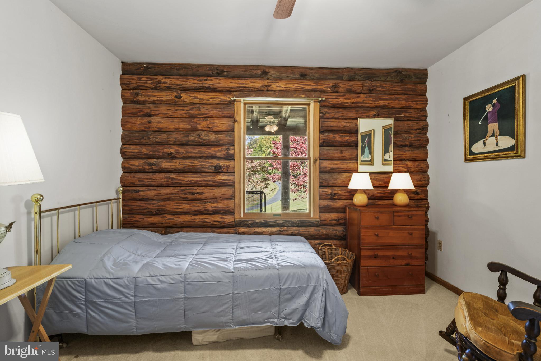 18151 New Cut Road Mount Airy, MD 21771 - Photo 22 of 49 Bedroom 2 w/ Exposed Logs