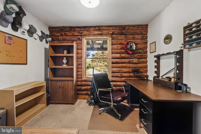 a view of a workspace with furniture