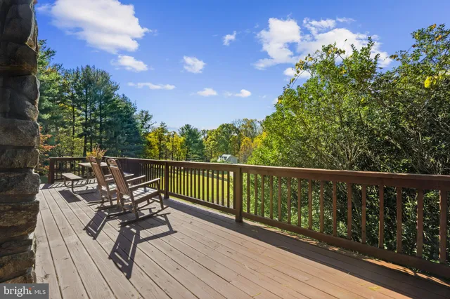 a view of balcony with furniture