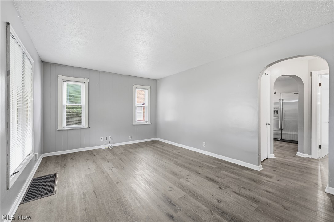 311 Fowles Road Berea, OH 44017 - Photo 6 of 40 Spacious room featuring light wood-finish flooring and light gray walls