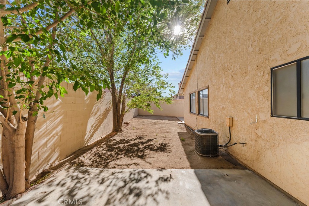 3542 East Ave R 10 Palmdale, CA 93550 - Photo 30 of 35 a view of a backyard of the house