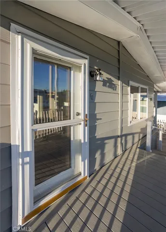 a view of a balcony with door