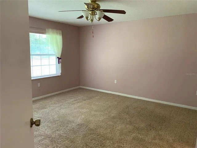 an empty room with a window