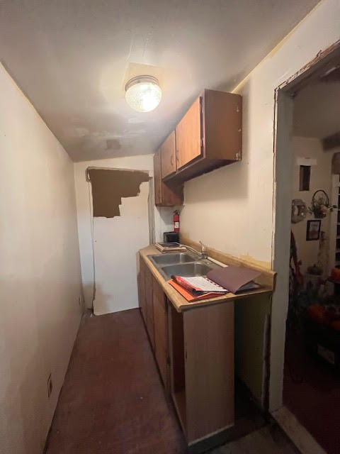 907 Virginia Street Key West, FL 33040 - Photo 11 of 19 a kitchen with a stove and a refrigerator