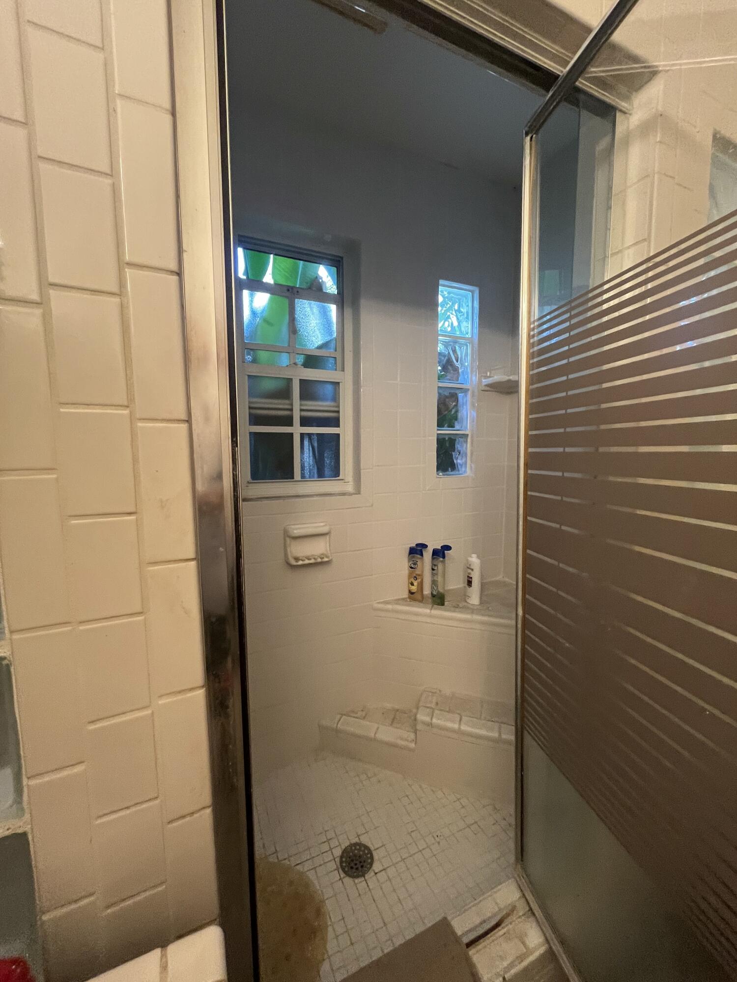 907 Virginia Street Key West, FL 33040 - Photo 18 of 19 a bathroom with a shower