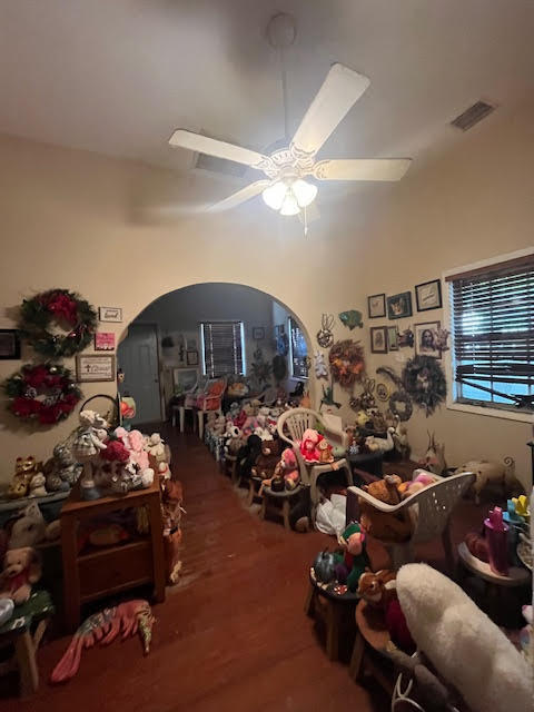 907 Virginia Street Key West, FL 33040 - Photo 7 of 19 a room with lots of flower plants