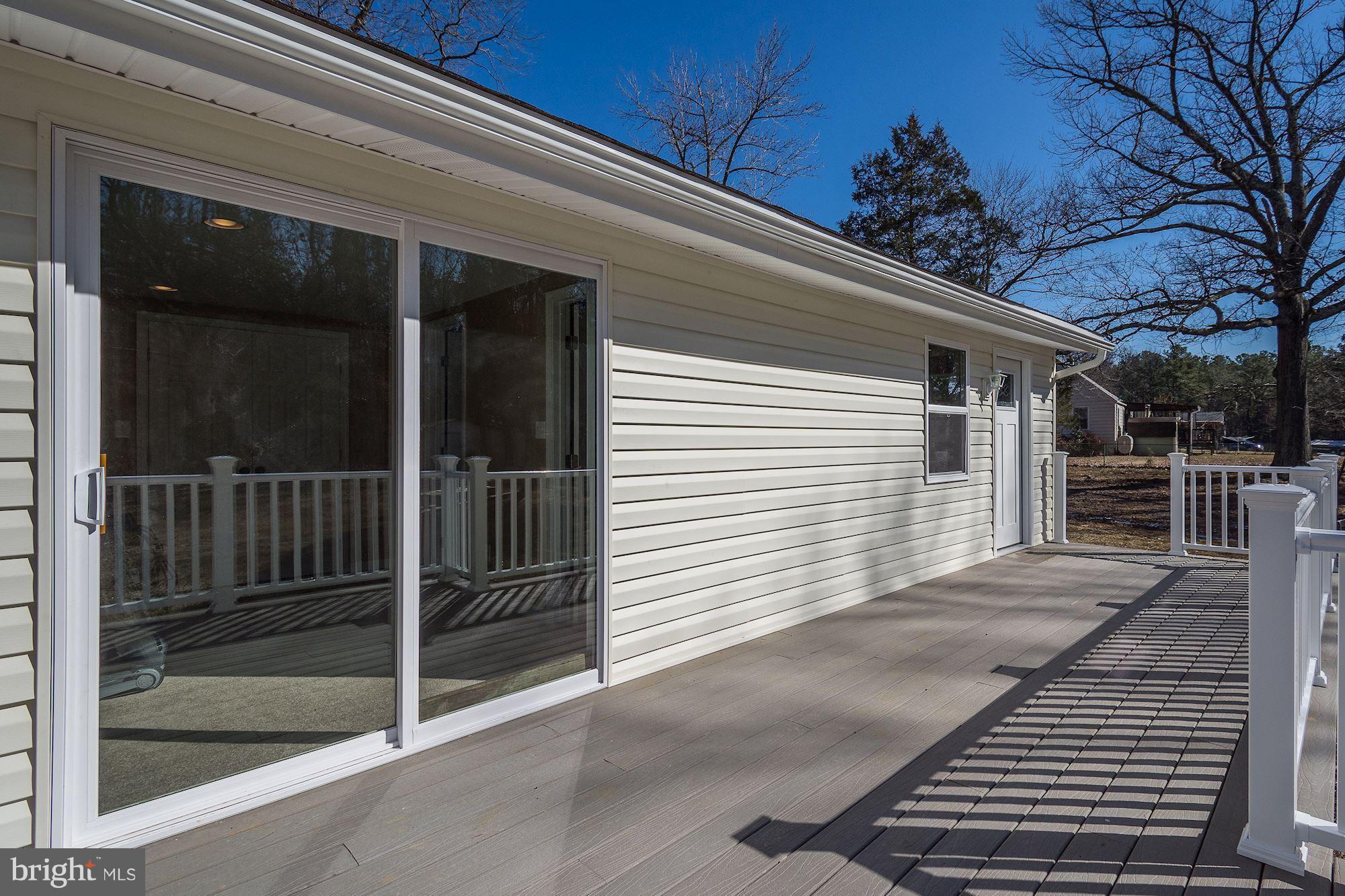 14103 South Springfield Road Brandywine, MD 20613 - Photo 28 of 30 Larger Deck Area by Master Bedroom