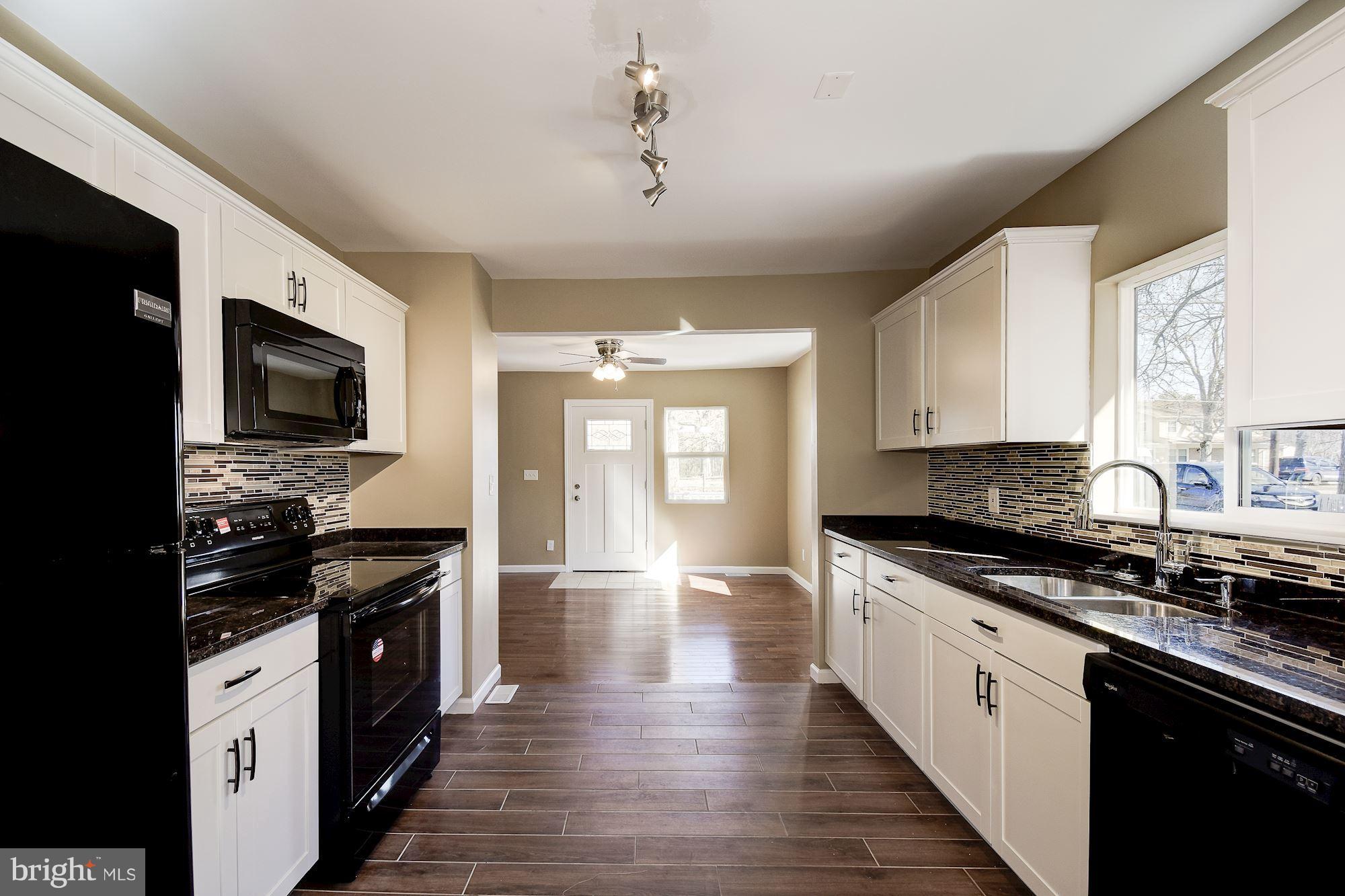 14103 South Springfield Road Brandywine, MD 20613 - Photo 9 of 30 Durable Ceramic Tile Wood look floors