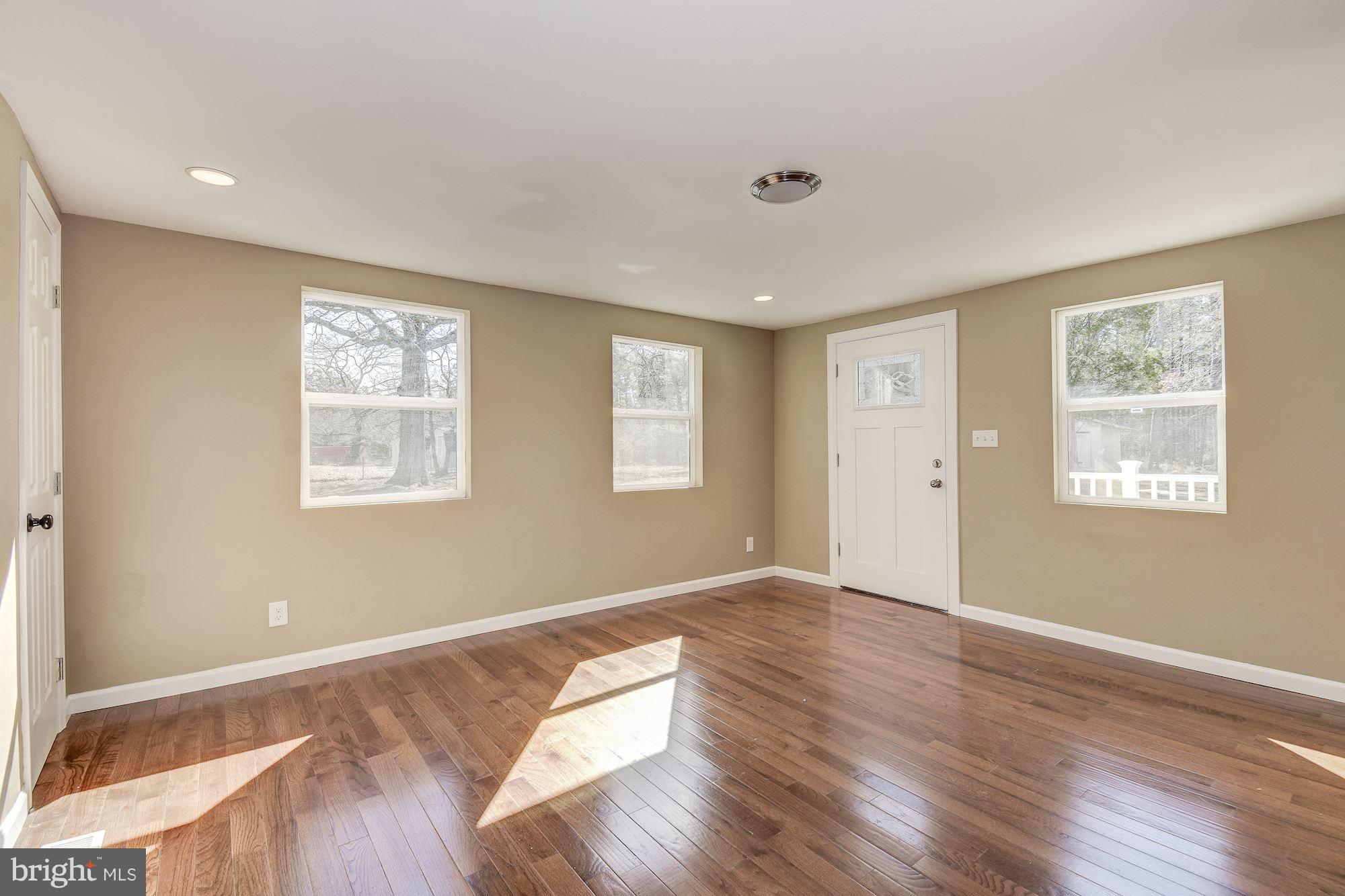14103 South Springfield Road Brandywine, MD 20613 - Photo 10 of 30 Gorgeous Hardwoods and New Door to Deck.