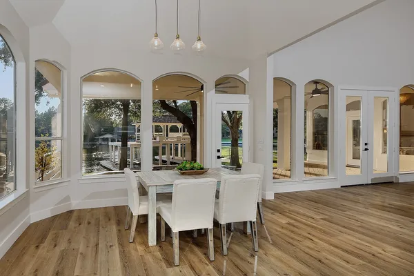a view of room with wooden floor and a window