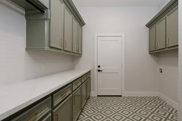 a view of wooden floor and cabinet in a room