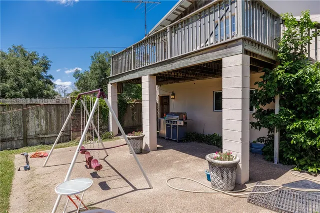 a view of a car parked in front of a house
