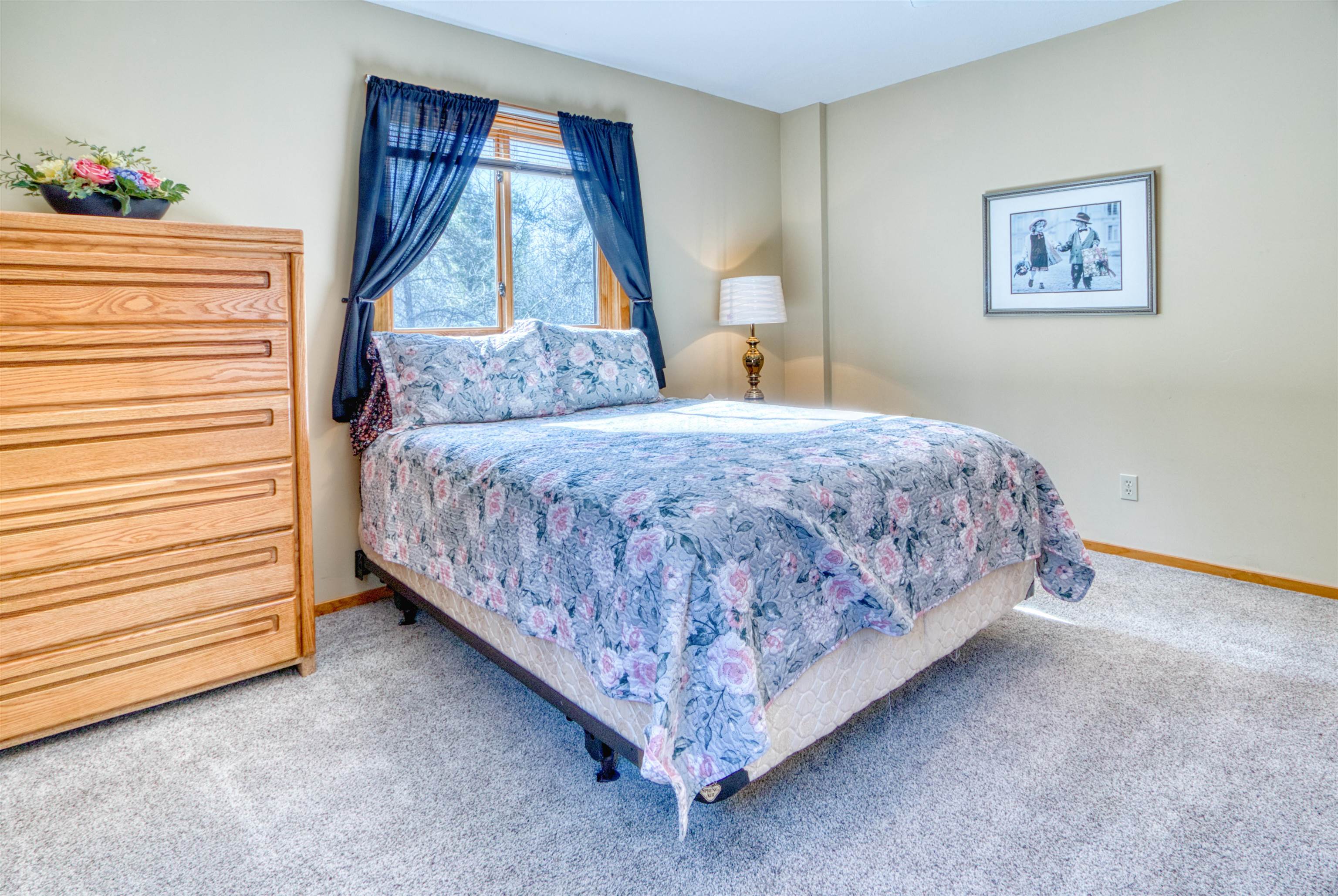 14366 North One Mile Road Minong, WI 54859 - Photo 25 of 40 Bedroom with carpet and baseboards