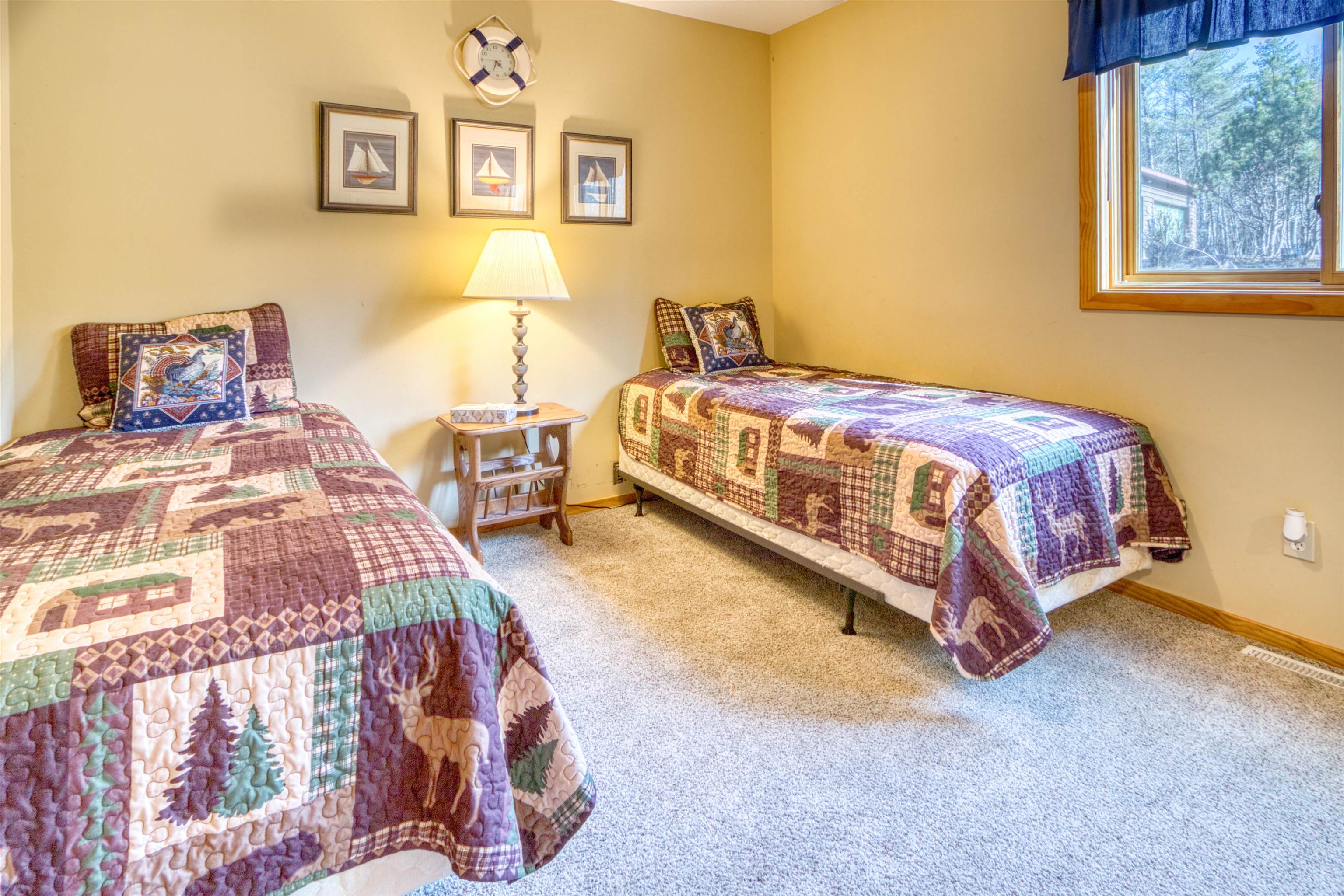 14366 North One Mile Road Minong, WI 54859 - Photo 26 of 40 Bedroom featuring baseboards, visible vents, and carpet flooring