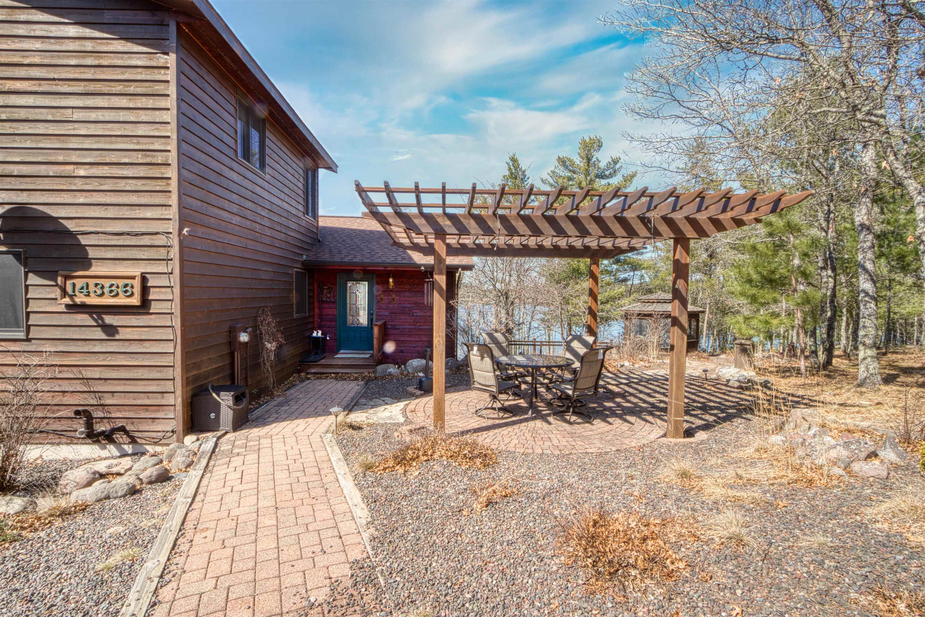 14366 North One Mile Road Minong, WI 54859 - Photo 4 of 40 View of patio featuring a pergola