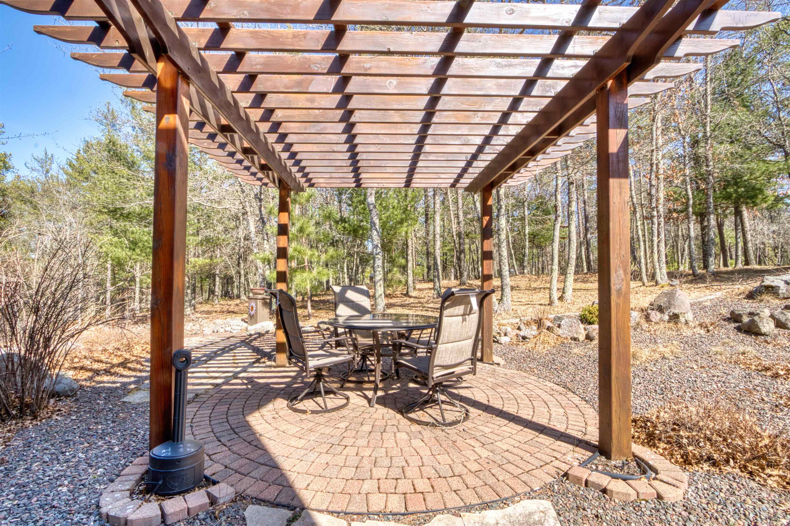 14366 North One Mile Road Minong, WI 54859 - Photo 6 of 40 View of patio / terrace with a pergola and outdoor dining area