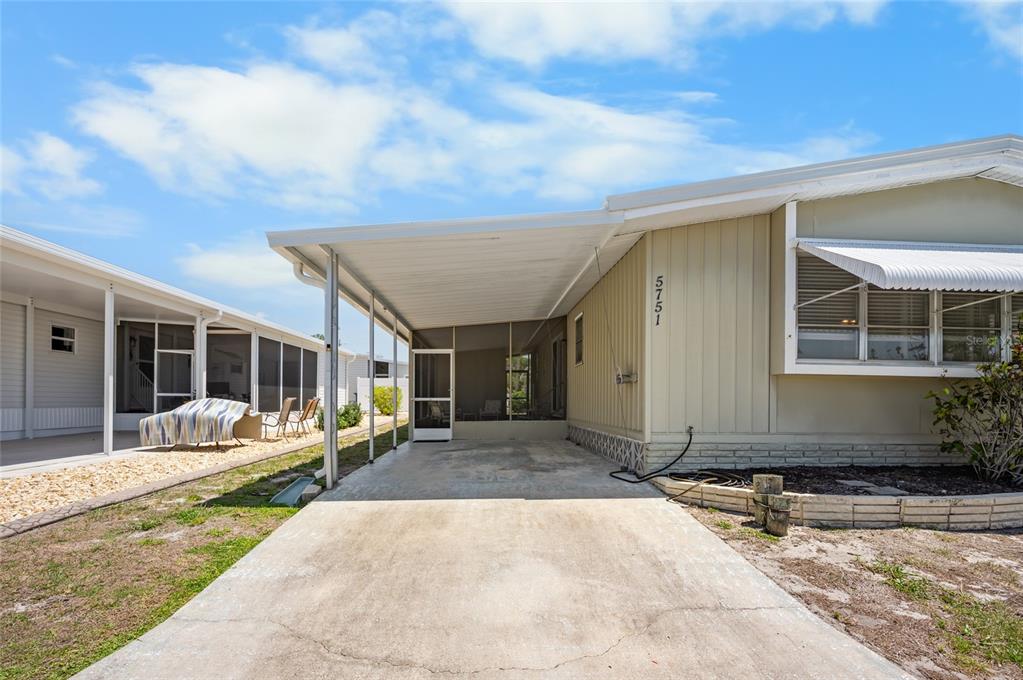 5751 Hyacinth Road Venice, FL 34293 - Photo 24 of 44 a front view of a house with a patio