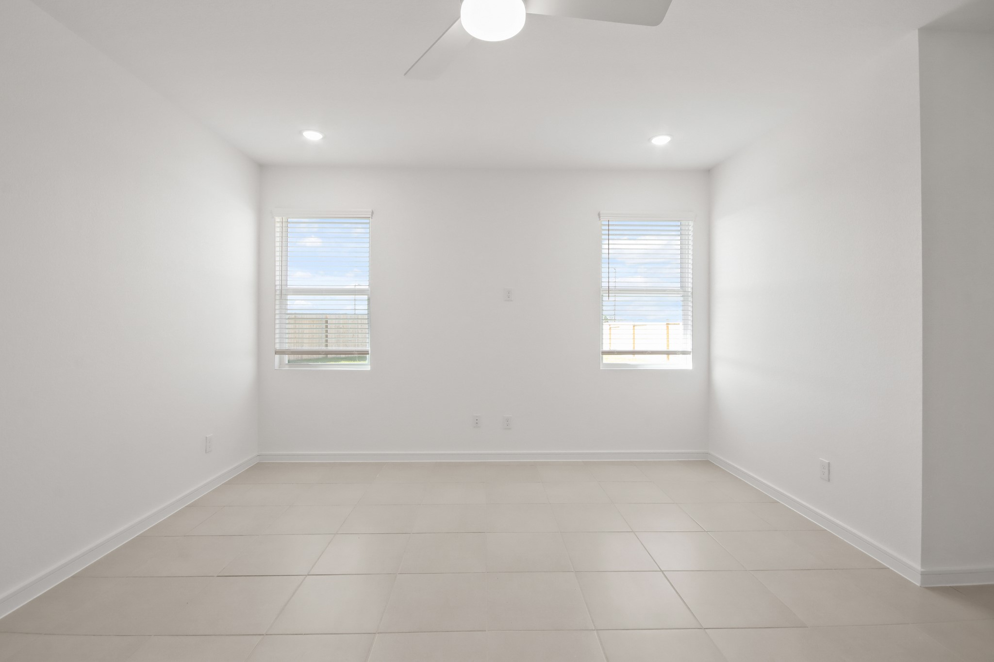 7811 Jasper Mdws Way Angleton, TX 77515 - Photo 7 of 26 an empty room with a empty space and a window