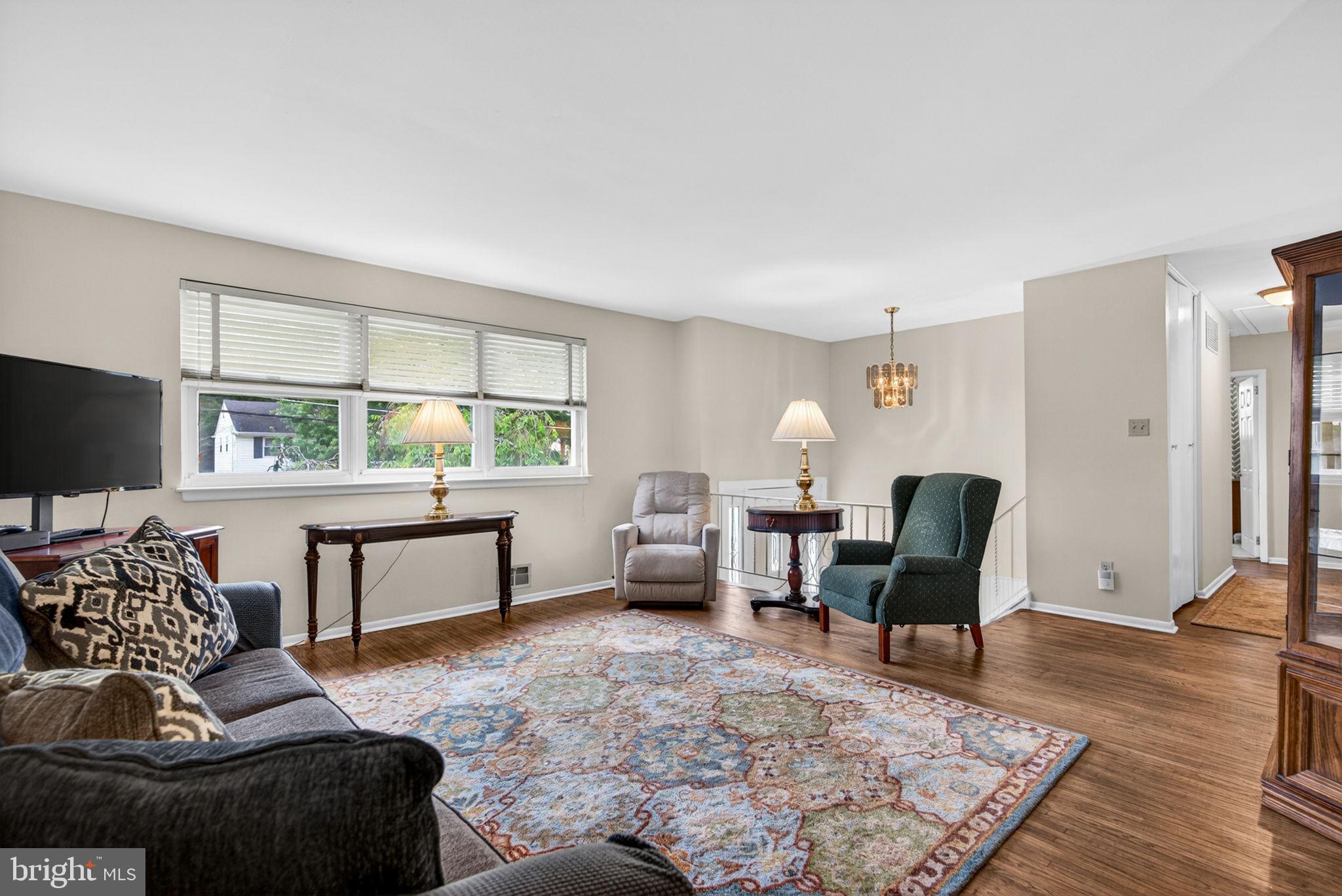 46 Trinity Avenue Marlton, NJ 08053 - Photo 7 of 37 a living room with furniture and a flat screen tv