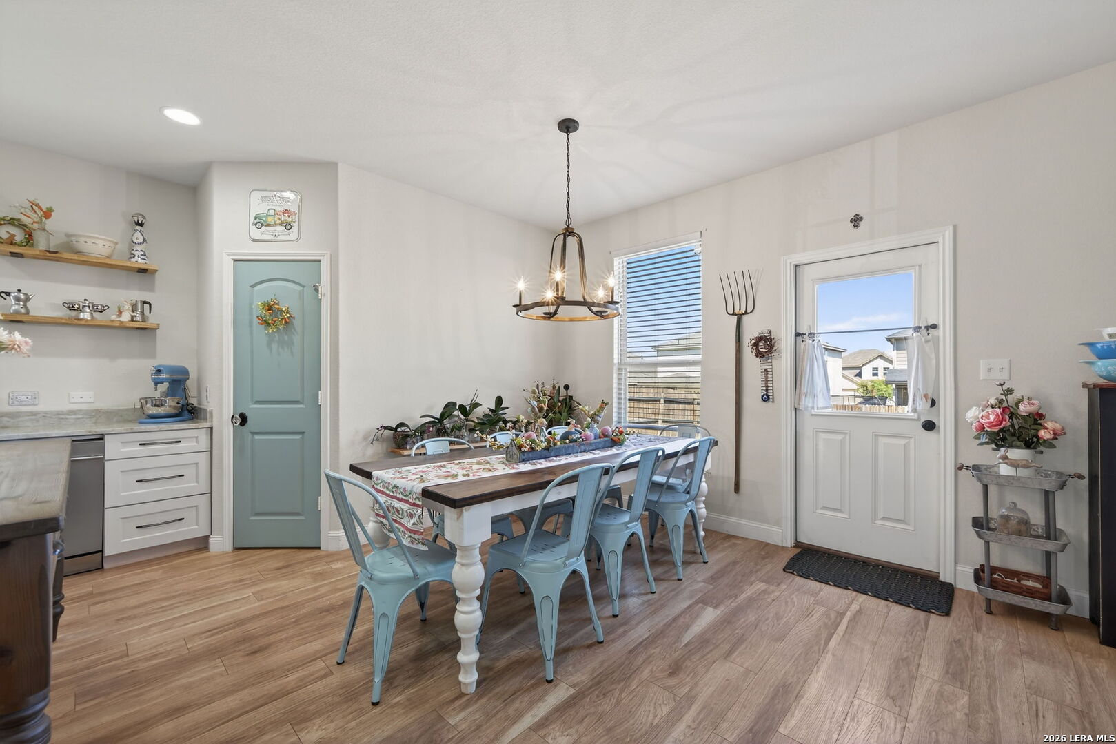 613 Whitman Avenue Georgetown, TX 78626 - Photo 11 of 24 a view of a dining room with furniture window and wooden floor