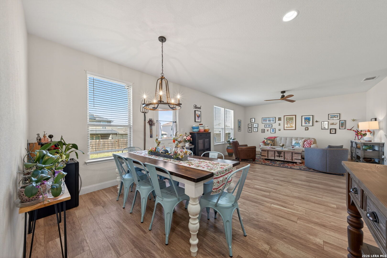 613 Whitman Avenue Georgetown, TX 78626 - Photo 12 of 24 a view of a dining room with furniture window and wooden floor
