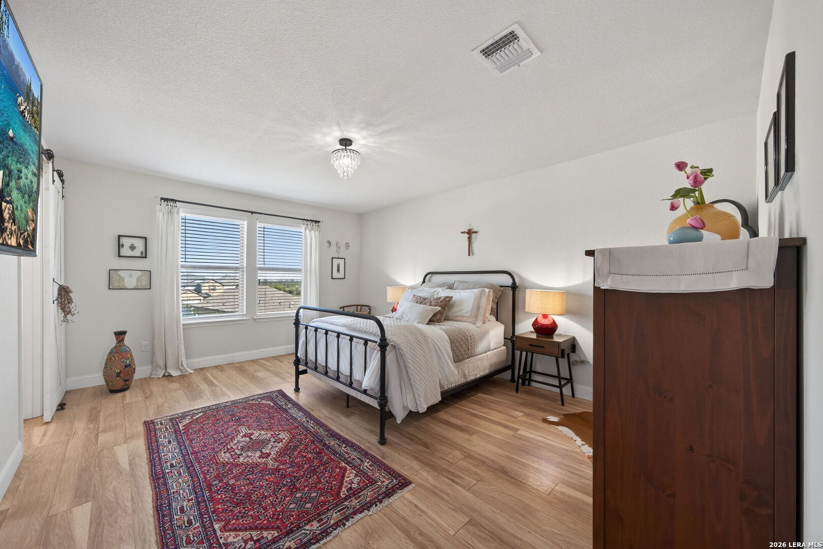 613 Whitman Avenue Georgetown, TX 78626 - Photo 16 of 24 a bed room with a bed and a window