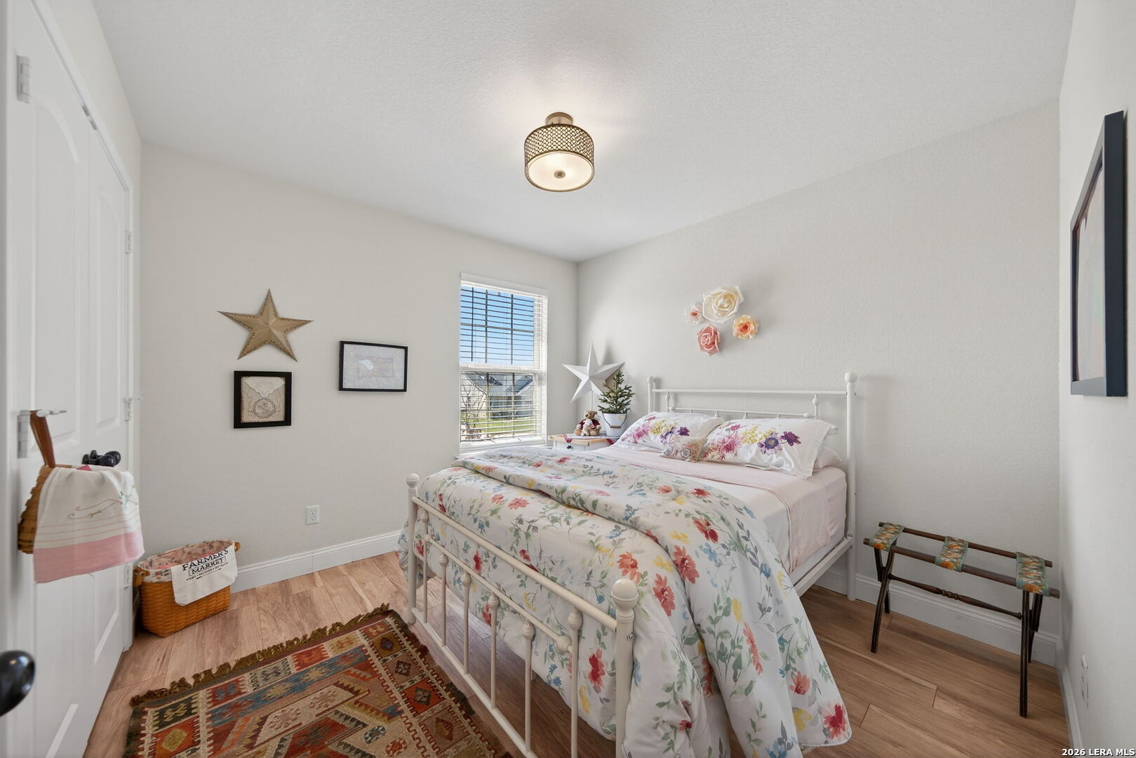 613 Whitman Avenue Georgetown, TX 78626 - Photo 19 of 24 a bedroom with a bed and a window