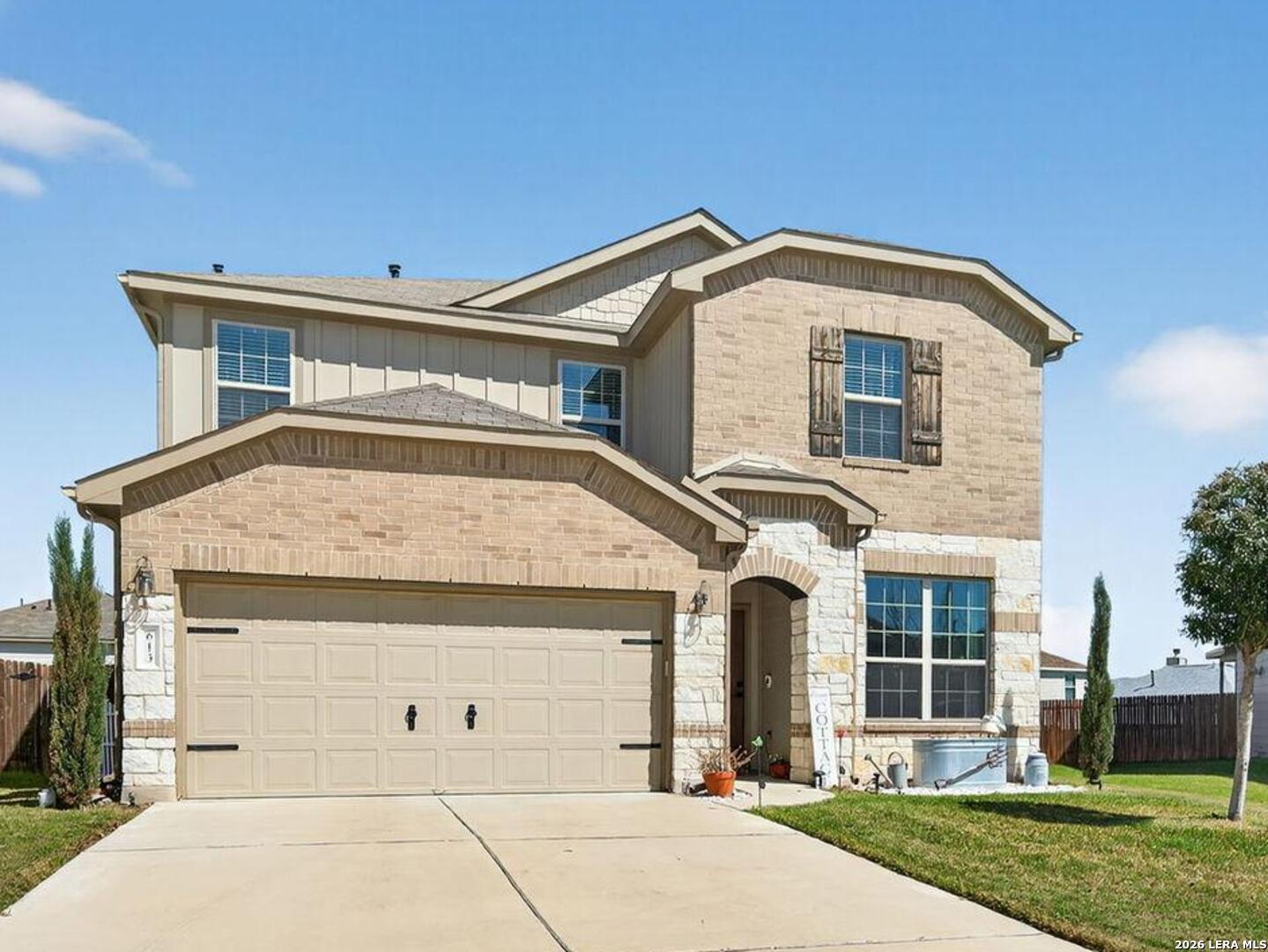 613 Whitman Avenue Georgetown, TX 78626 - Photo 2 of 24 a front view of a house with a yard