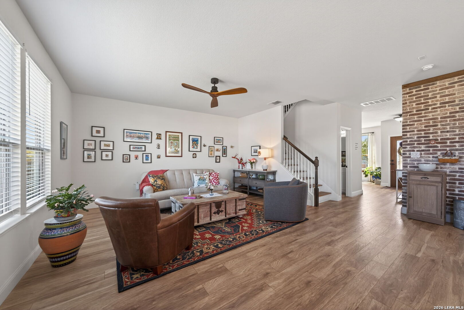613 Whitman Avenue Georgetown, TX 78626 - Photo 4 of 24 a living room with furniture and wooden floor