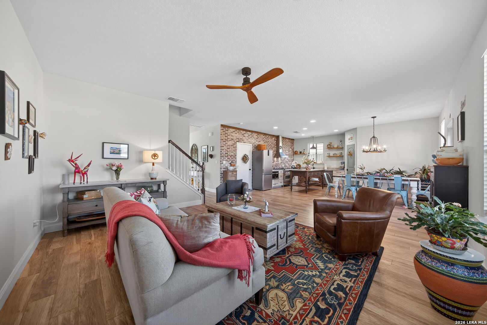 613 Whitman Avenue Georgetown, TX 78626 - Photo 6 of 24 a living room with furniture chess board and a ceiling fan