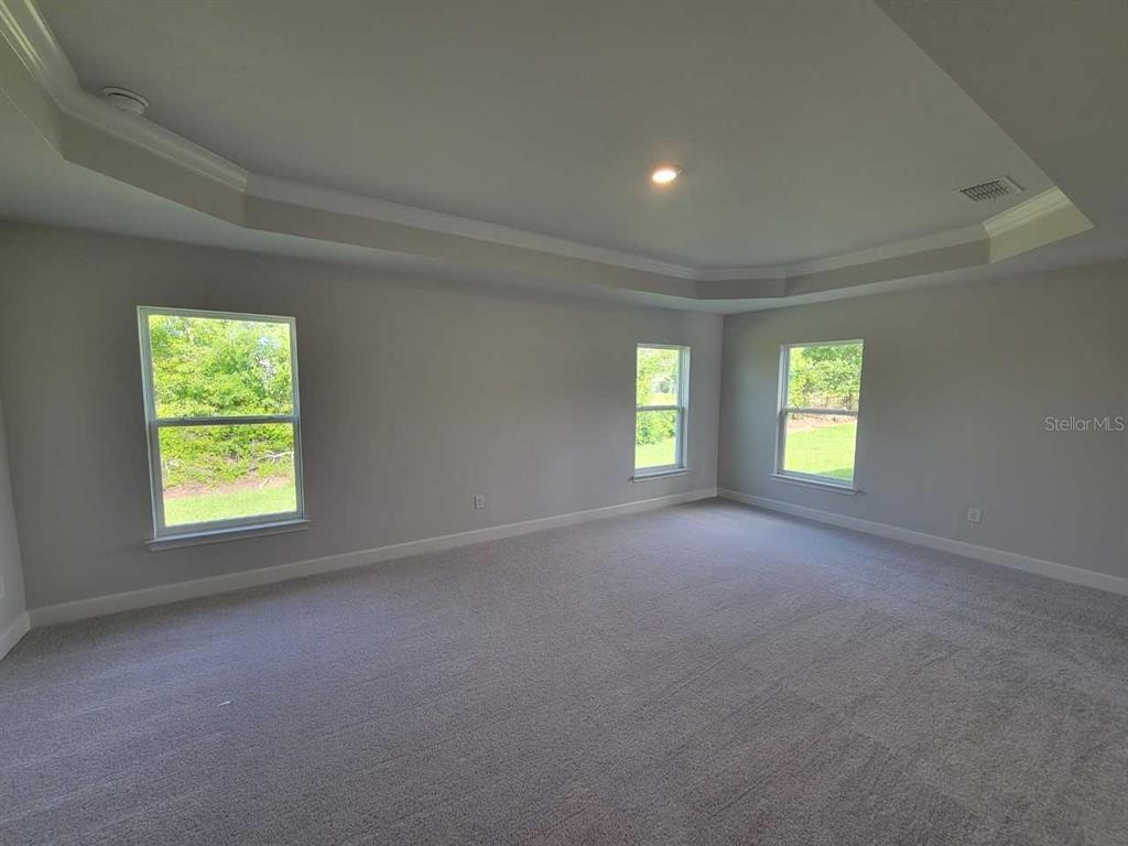 4525 Southwest 91st Ln Road Ocala, FL 34476 - Photo 13 of 20 an empty room with windows