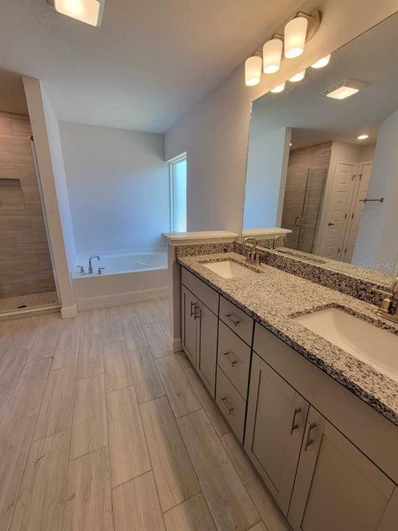 4525 Southwest 91st Ln Road Ocala, FL 34476 - Photo 19 of 20 a bathroom with a sink and a mirror